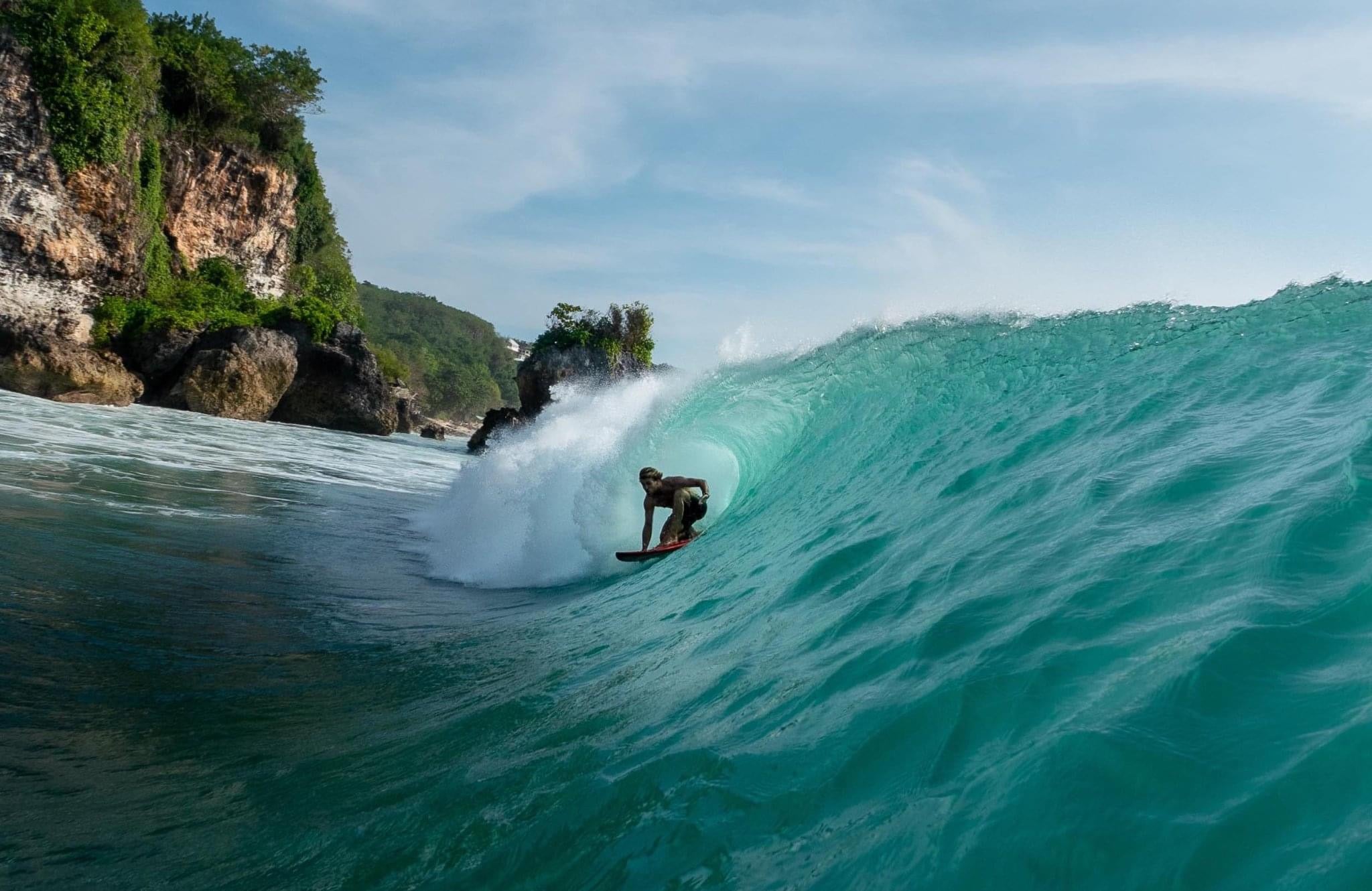 Dan deep in a tropical barrel