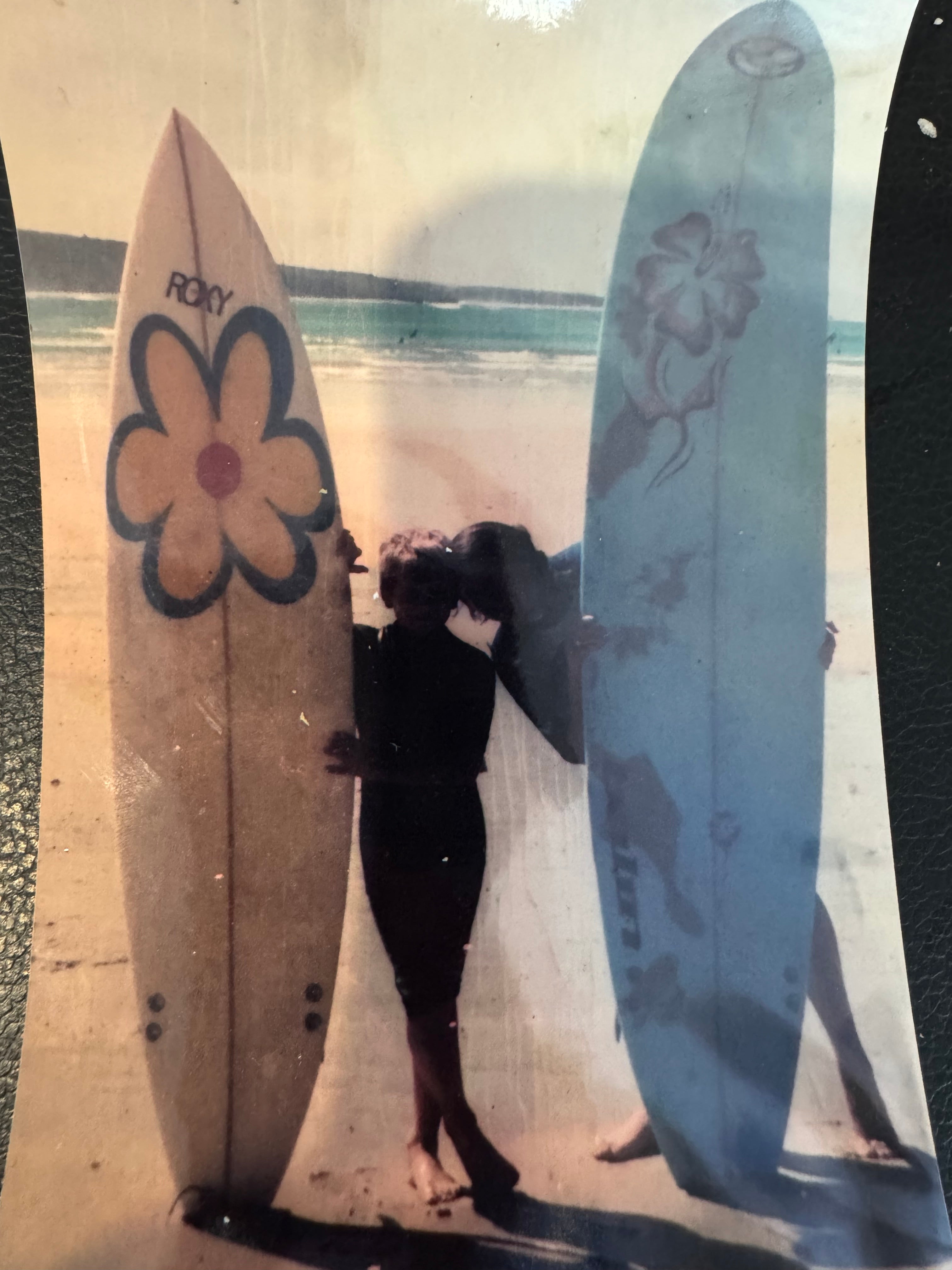 Sarah and Dan with their surfboards