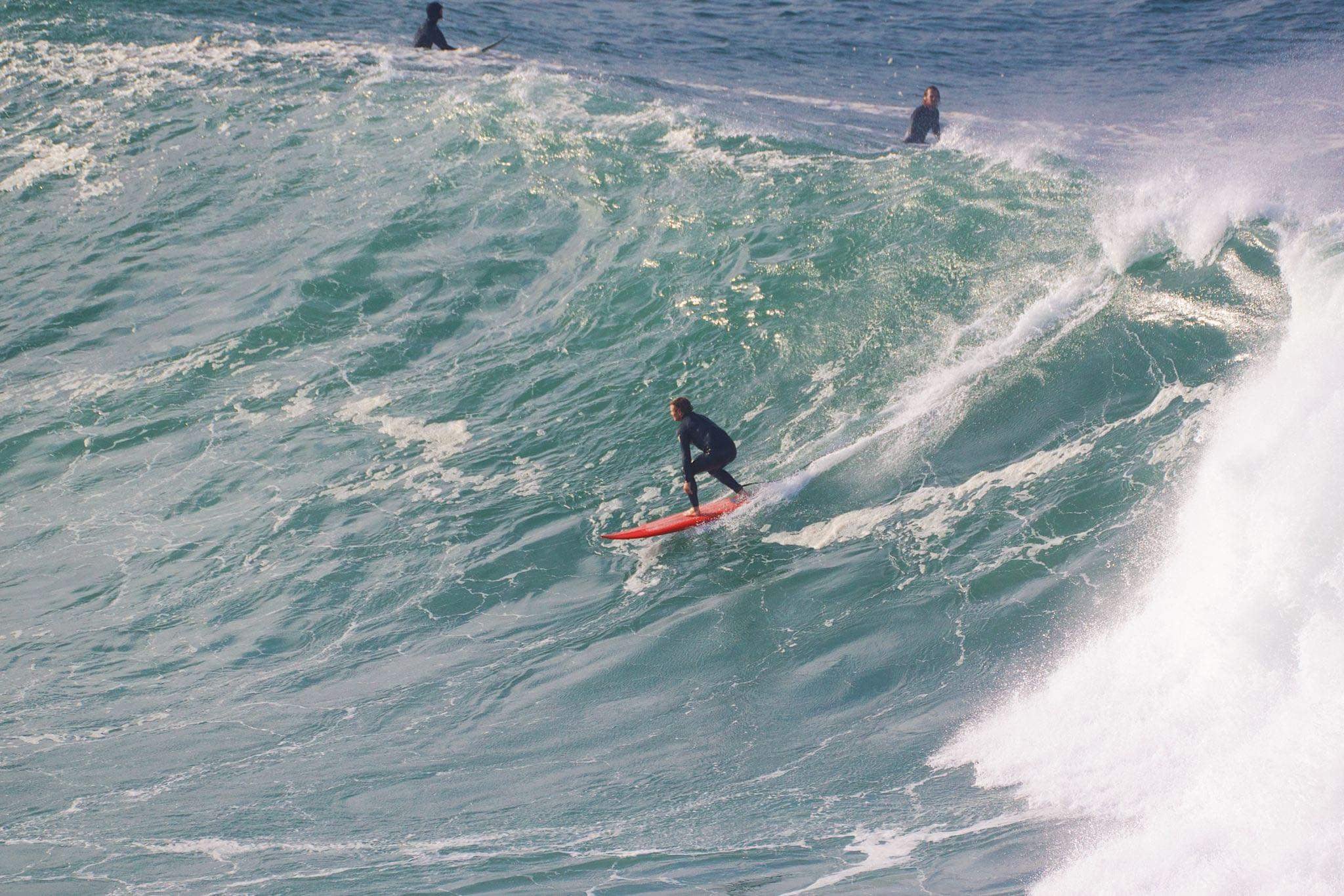Dan dropping into a big green wall